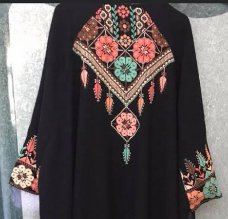 Gown embroidered by Fedaa